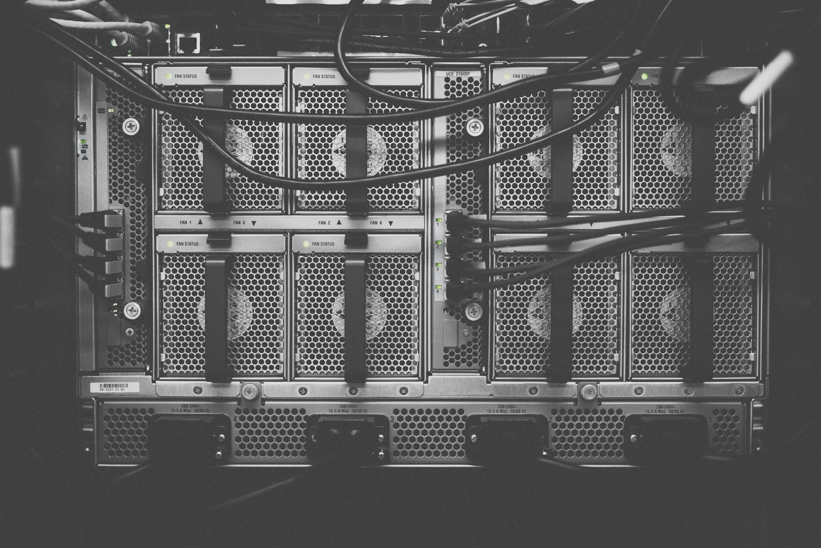 A black wall of server panels in a web hosting facility.